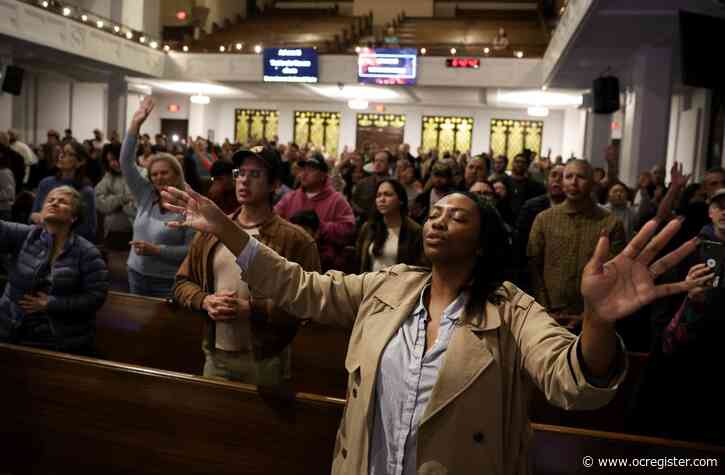 ‘My heart breaks with yours’: In Pasadena, divergent faiths pray for strength amid deadly wildfires