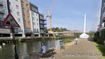 Man's body is pulled from river as police launch probe into 'unexplained' death