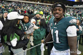 Eagles receiver A.J. Brown was reading a book on the sidelines of team's playoff win