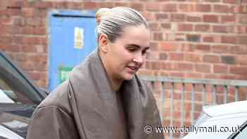 Molly-Mae Hague looks fresh-faced as she goes makeup-free for a visit to her office - as she gears up for the release of her new documentary amid Tommy Fury romance speculation