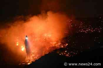 News24 | 'Dangerous and strong' winds threaten to spread LA inferno