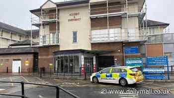 Man, 37, is charged with attempted murder after 'popular' nurse stabbed 'with a pair of scissors' on busy A&E ward