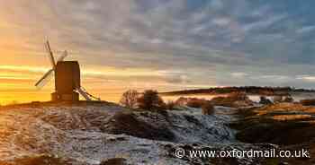 Photographer captures stunning sunset at Brill Windmill on frosty evening