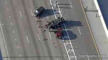 Woman standing by car after crash struck and killed in 2nd crash on I-95 in Broward