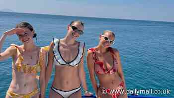 Lucia Hawley shows off incredible figure in $295 designer bikini as she enjoys boat trip with her siblings