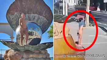 Woman arrested for stripping naked and posing on public sculpture in shock photoshoot