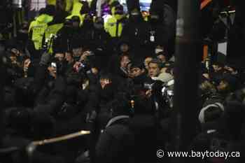 South Korean law enforcement officers enter presidential compound to detain impeached Yoon