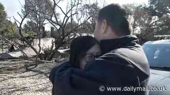 Heartwarming moment tearful firefighter whose own home burnt down in LA infernos while he worked a 16 hour shift battling flames finds his wedding ring in the ashes