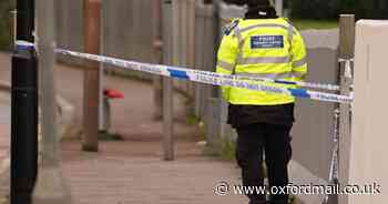 Two men arrested as police swarm Oxford house