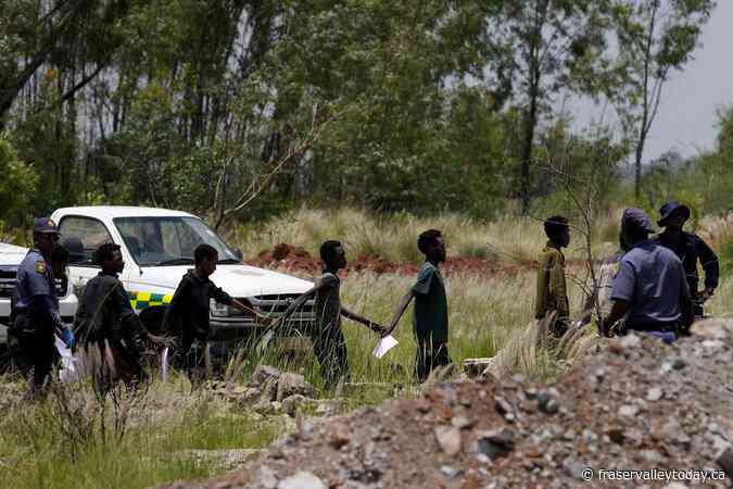 South African police announce the sudden end of mine rescue operation