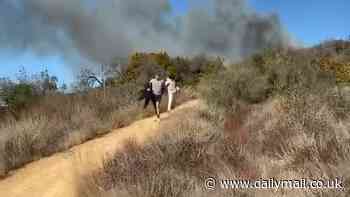 Meditating hikers blamed for starting LA fires break their silence