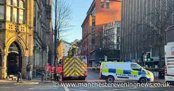 "The smell of gas was really strong - we had to get out": Chaos as city centre street evacuated after workers 'dig through live gas pipe'