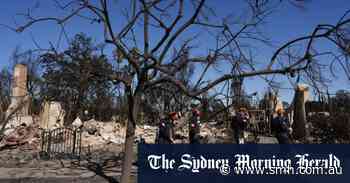 Los Angeles wildfires rage as strong winds put millions at risk