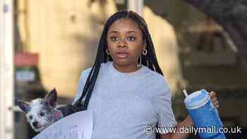 Pregnant Skai Jackson shows off her baby bump in casual look while taking her dog to the vet in Los Angeles