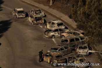 LA fires live updates: Southern California gets break from fire-fanning winds but warnings persist