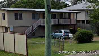 Woman allegedly set on fire left fighting for life as police descend on a home in Logan, Queensland