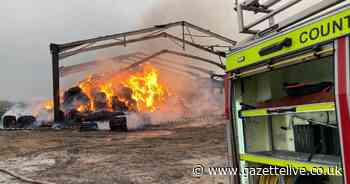 Huge barn blaze near A1 with firefighters warning drivers to keep windows shut