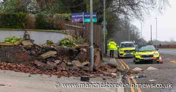 Man and woman remain in hospital after BMW smashes into wall