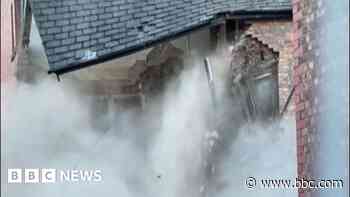 Watch: Building collapses in busy village centre