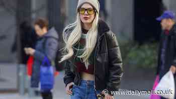 Tori Spelling bares her tummy in freezing NYC after fearing looters had trashed her LA home