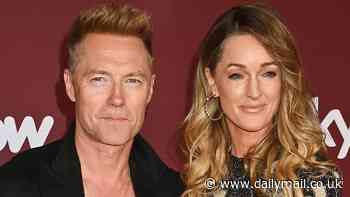 Ronan Keating is supported by his glamorous wife Storm as they attend the launch of warts-and-all Boyzone documentary No Matter What