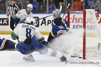 Garland scores twice to help Canucks beat the Blues 5-2