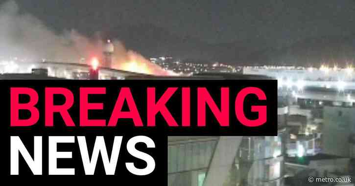 Fire breaks out on plane with 176 people on board