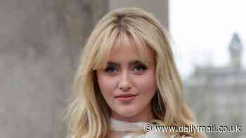 Kathryn Newton dazzles in a sheer gold dress at Georges Chakra Haute Couture's Paris Fashion Week show