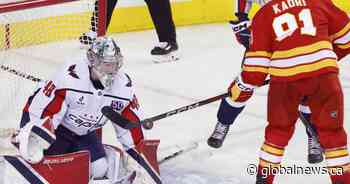 Thompson stops 32 shots as Capitals down Flames 3-1