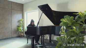 Keys to happiness: See how a baby grand piano sparks joy at a Fredericton arts centre