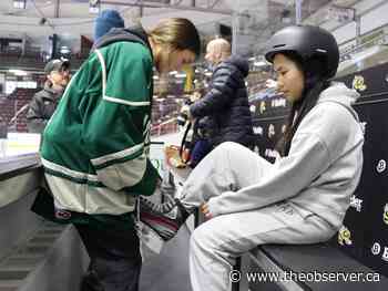 Sarnia high school hockey players share the ice with newcomer students