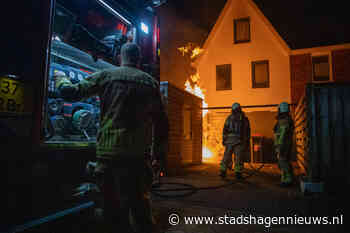 Container vat vlam achter woning Vechterweerdhof