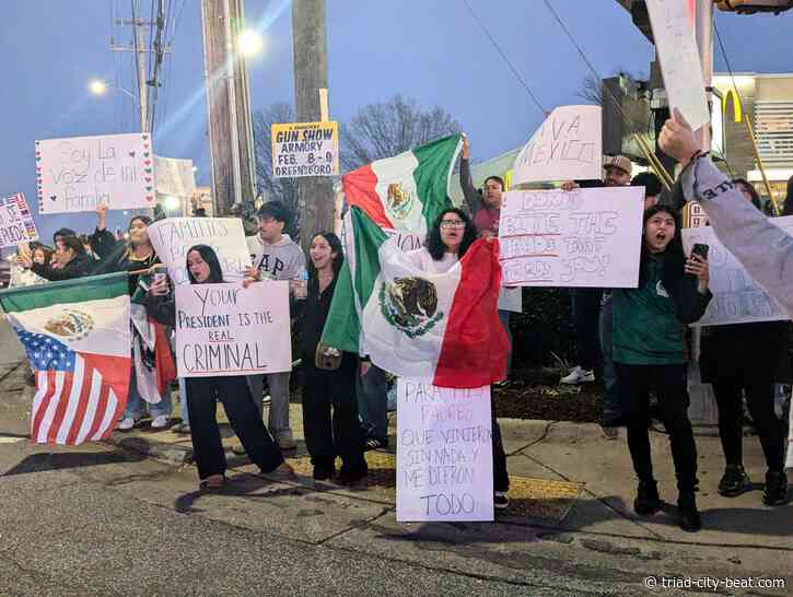 Hundreds gather in Greensboro, shut down part of boulevard on Sunday to protest President Trump, ICE deportations