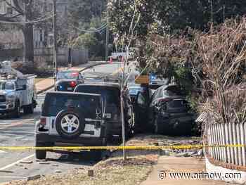 JUST IN: Road near hospital blocked after driver smashes into wall, utility pole