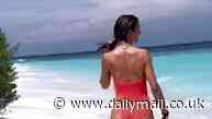 Frida Redknapp shows off her sensational figure in a coral swimsuit as she struts along the beach at luxury Maldives wellness resort