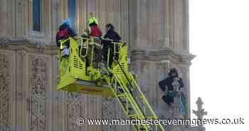 Standoff continues as barefoot man waving Palestine flag remains on Elizabeth Tower ledge