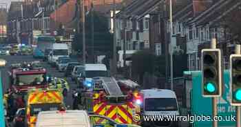 Motorist in hospital after car overturns during crash on Wirral street