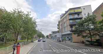 Man taken to hospital after stabbing on busy south west London road