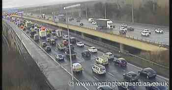 M6 in Warrington is gridlocked this evening with commuters facing long queues