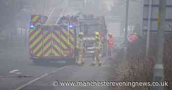 LIVE: Crews descend on Stockport street as smoke billows from building fire - latest updates