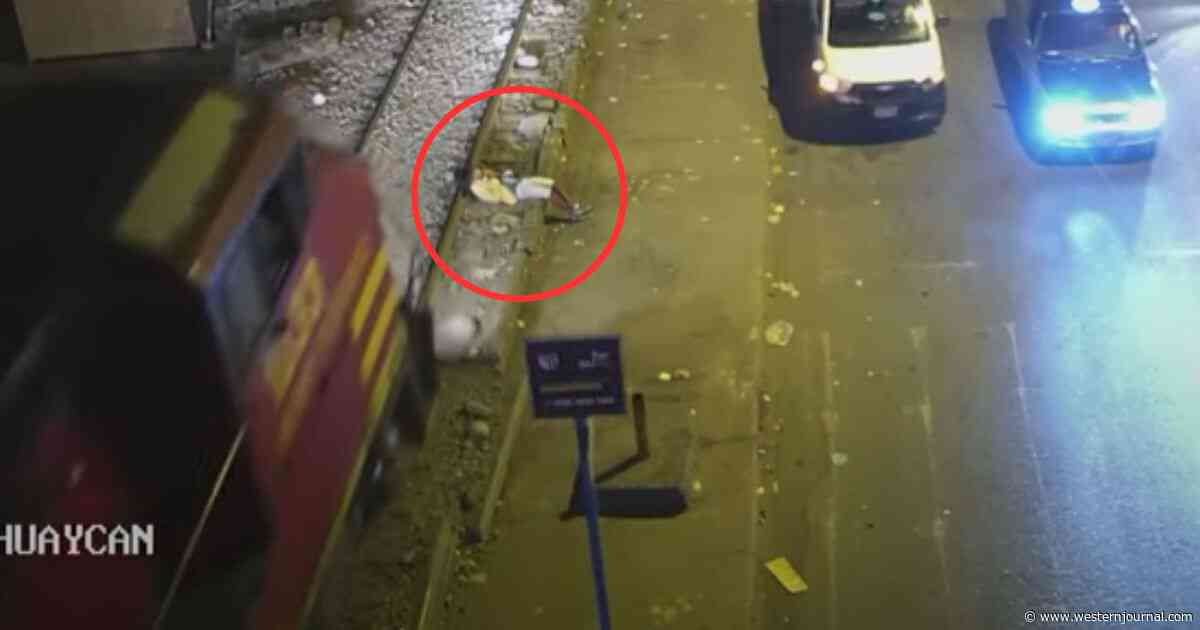 Man Hit by Train and Crumpled Underneath It - Seconds Later, Camera Catches Miraculous Sight