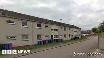 Woman taken to hospital after flat fire in Elgin
