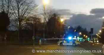 Police cordon off main road after woman struck by car