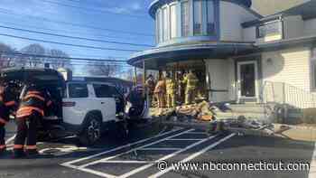Car crashes into dentist office and other cars in Milford