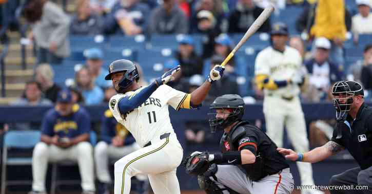 Brewers split a win and a loss in hectic afternoon