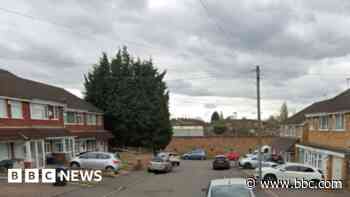 Four 'slashed at' in knife attack in street