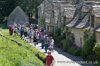 Pretty English village overrun by tourists weighs ban on coaches after angry clashes
