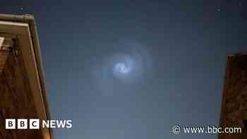 Strange sky swirl, masked man and jailed boxer