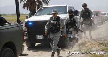 Gunmen torch vehicles across Mexico as cartel turf war rages