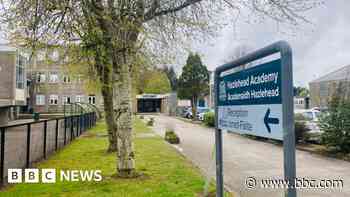 Girl, 14, charged over knife incident at high school